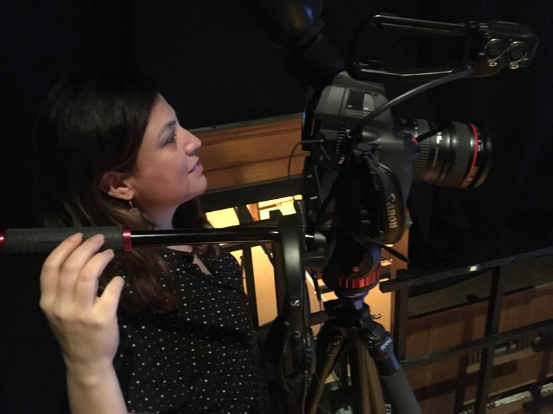 Nathalie Lopez trainee using a camera. Director of photography, program front des réalisateurs indépendants du Canada (FRIC)